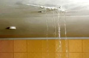 Ceiling damaged by water leaking from an air conditioner inside the home