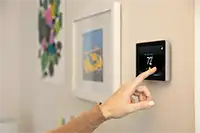 Residential AC Thermostat installation by Extreme Comfort Air Conditioning and Heating in Addison Texas