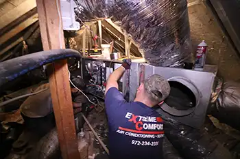 HVAC technicians installing a new air conditioning system in McKinney Texas