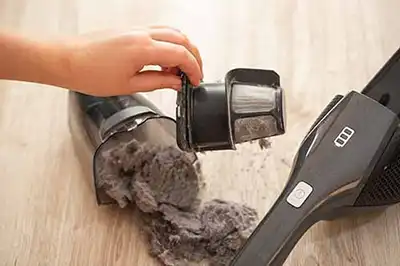 Vacuum cleaner and dust to save money on air conditioning in the summer in Dallas