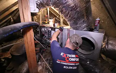 HVAC technician repairing furnace that is not Heating a Home?